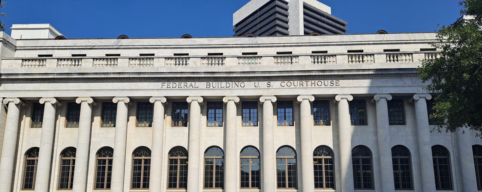 A courthouse representing the choice between a federal ADEA and an Ohio age discrimination claim