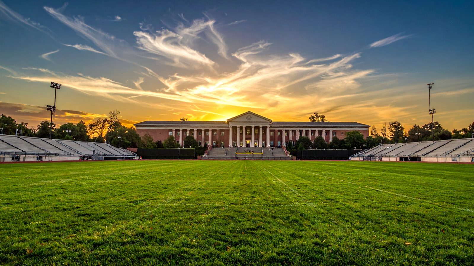Sunset over an academic campus, representing Title IX coverage during study abroad programs